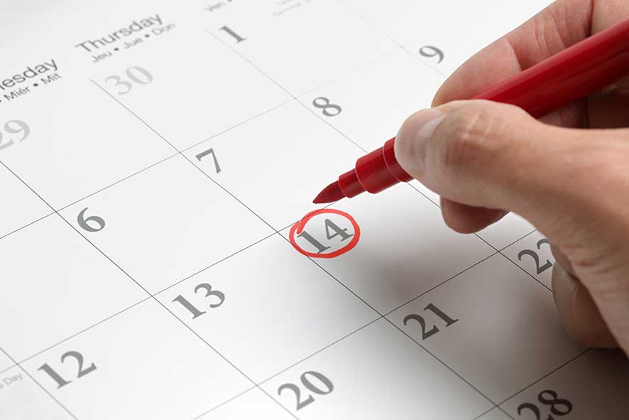 Red circle marked on a calendar concept for an important day